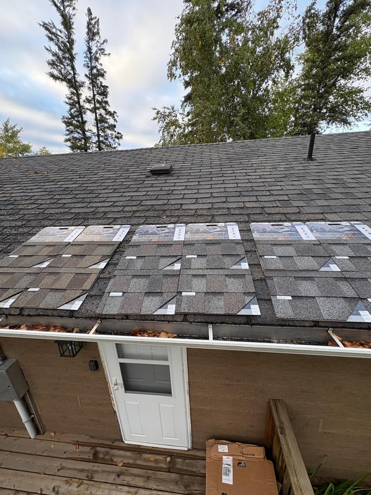 Tear-off of old shingles down to the deck